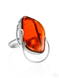Ажурное кольцо с цельным янтарём ярко-коньячного цвета «Маньяна» Amberholl