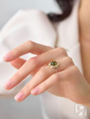 Красивое ажурное кольцо «Мальвина» из серебра с золочением и зелёного янтар